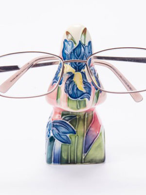 bright blue, yellow green colours hand painted and tube lined eyeglass stand