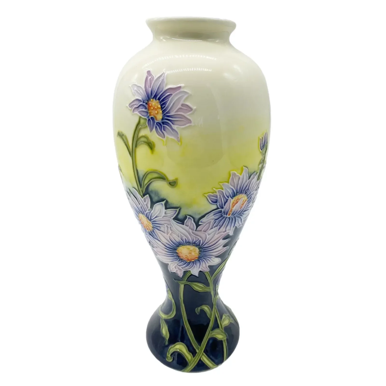 Pretty Lilac Daisy flowers surround this tube lined pottery piece hints of yellow and cream background