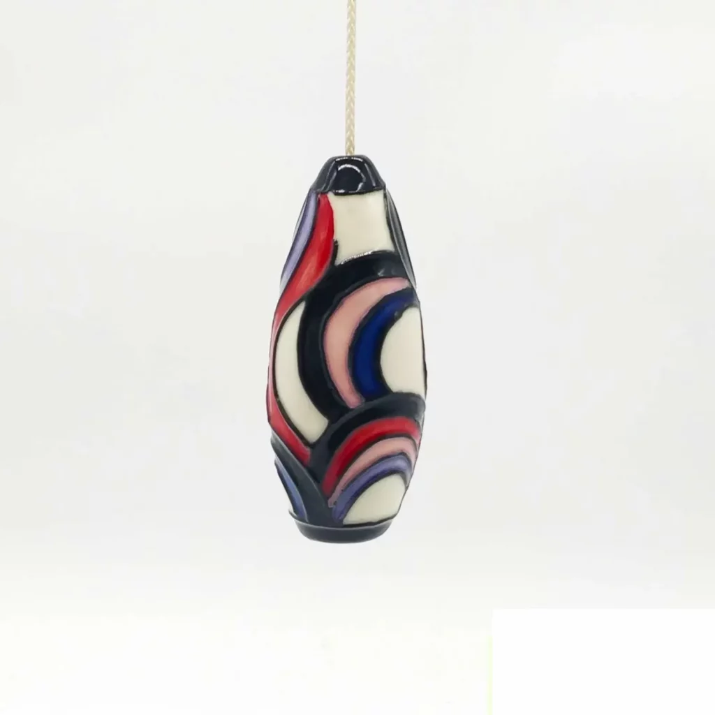 earthenware clay hand painted light pull with art deco style pattern