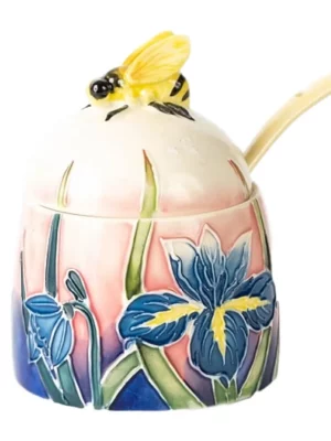 Small honey jar with bold blue iris flower, bee on lid and spoon included