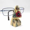 Side view of Glasses Holder with red flower displayed as a pattern