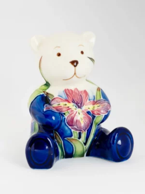 blue bear ornament with pretty floral pattern made from earthenware pottery hand painted