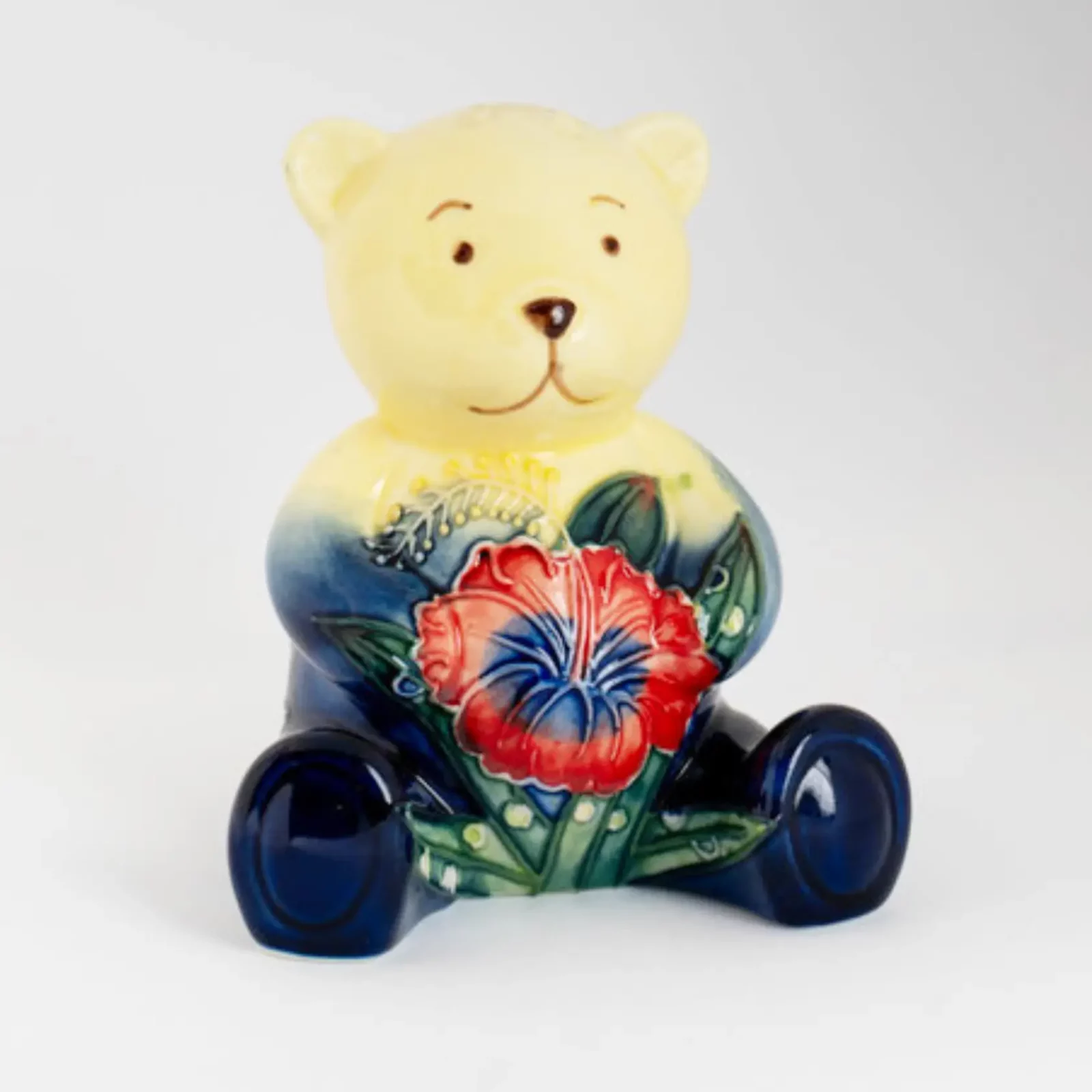 bear ornament cream colour with navy blue and bold red hibiscus flower hand painted