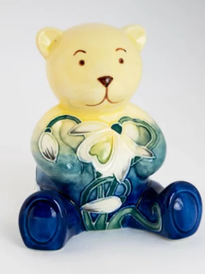 ornament made from pottery of small bear and flower pattern