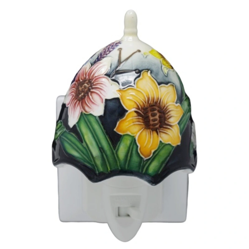 pretty pottery plug in night light with yellow and red flower combination made by tupton ware