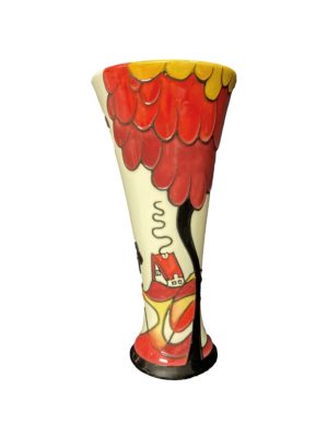 Red and yellow hues showing home and large tree style on this ceramic painted vase